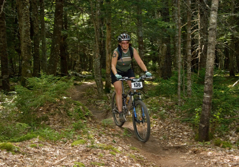 Sue riding the amazing trails in Gore during a race.