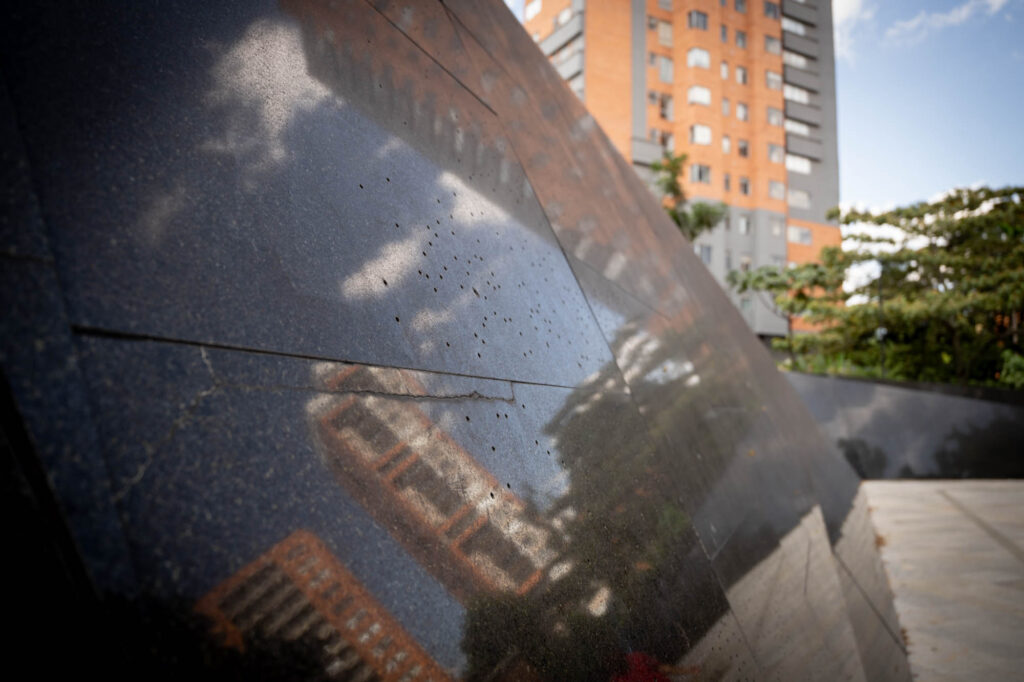 46612 holes in this rock each represent the dead.